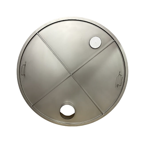 Round metallic object with cut-out sections on a white background