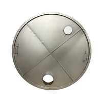 Round metallic object with cut-out sections on a white background